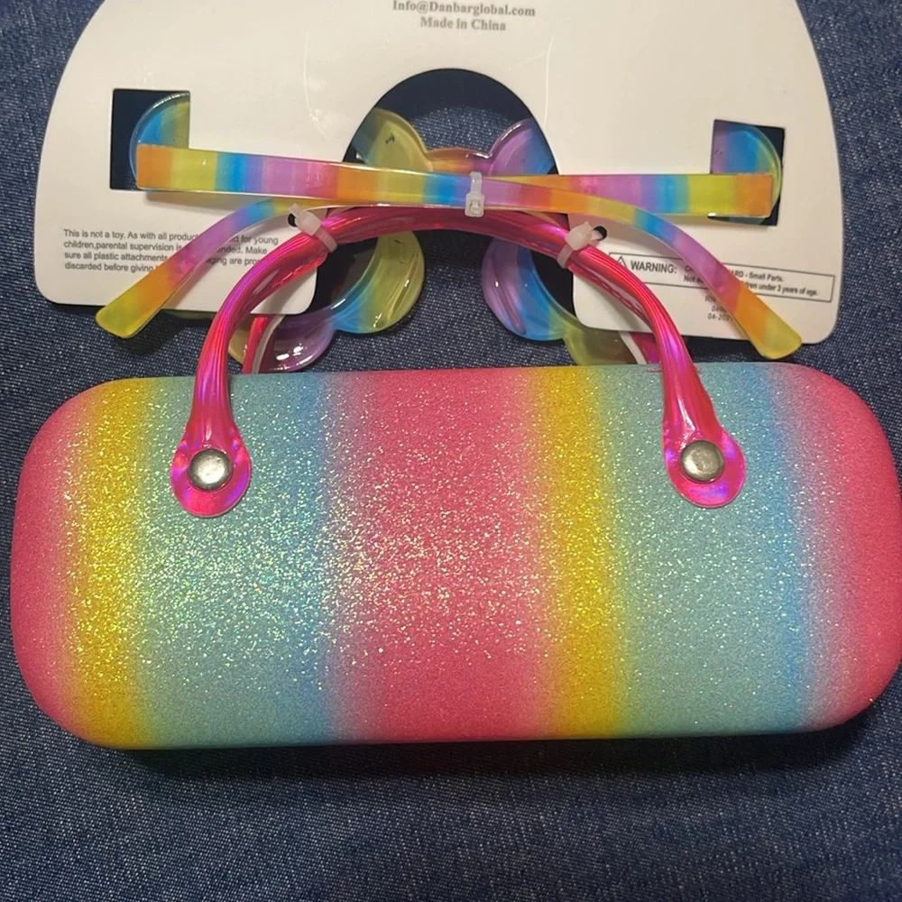 Sunglasses and case. Little girl. Few scratches on the frame. See pictures